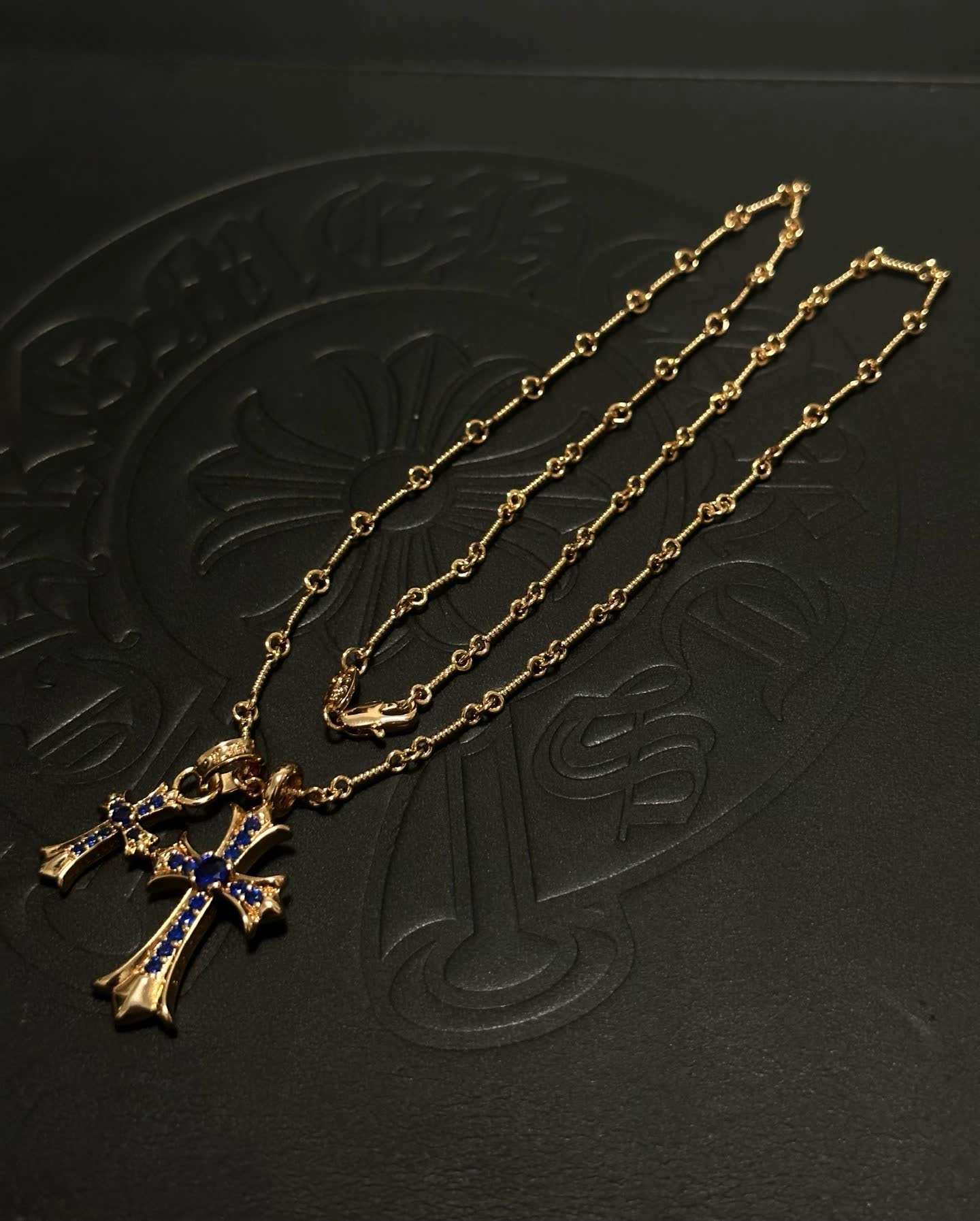 Chrome Hearts Carrera Gold-Tone Blue Crystal Cross Pendant Necklace Chrome Hearts Carrera Gold-Tone Blue Crystal Cross Pendant Necklace